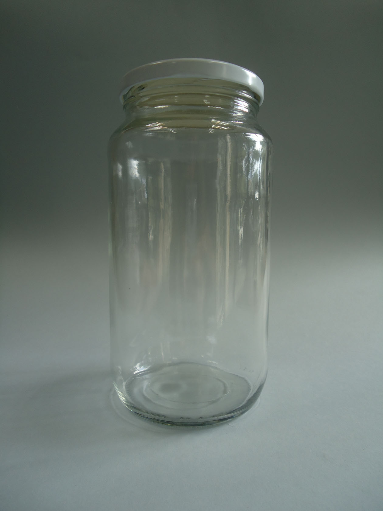 Bote vidrio tapa metálica blanca twist  935 ml. (caja 30 uni.)